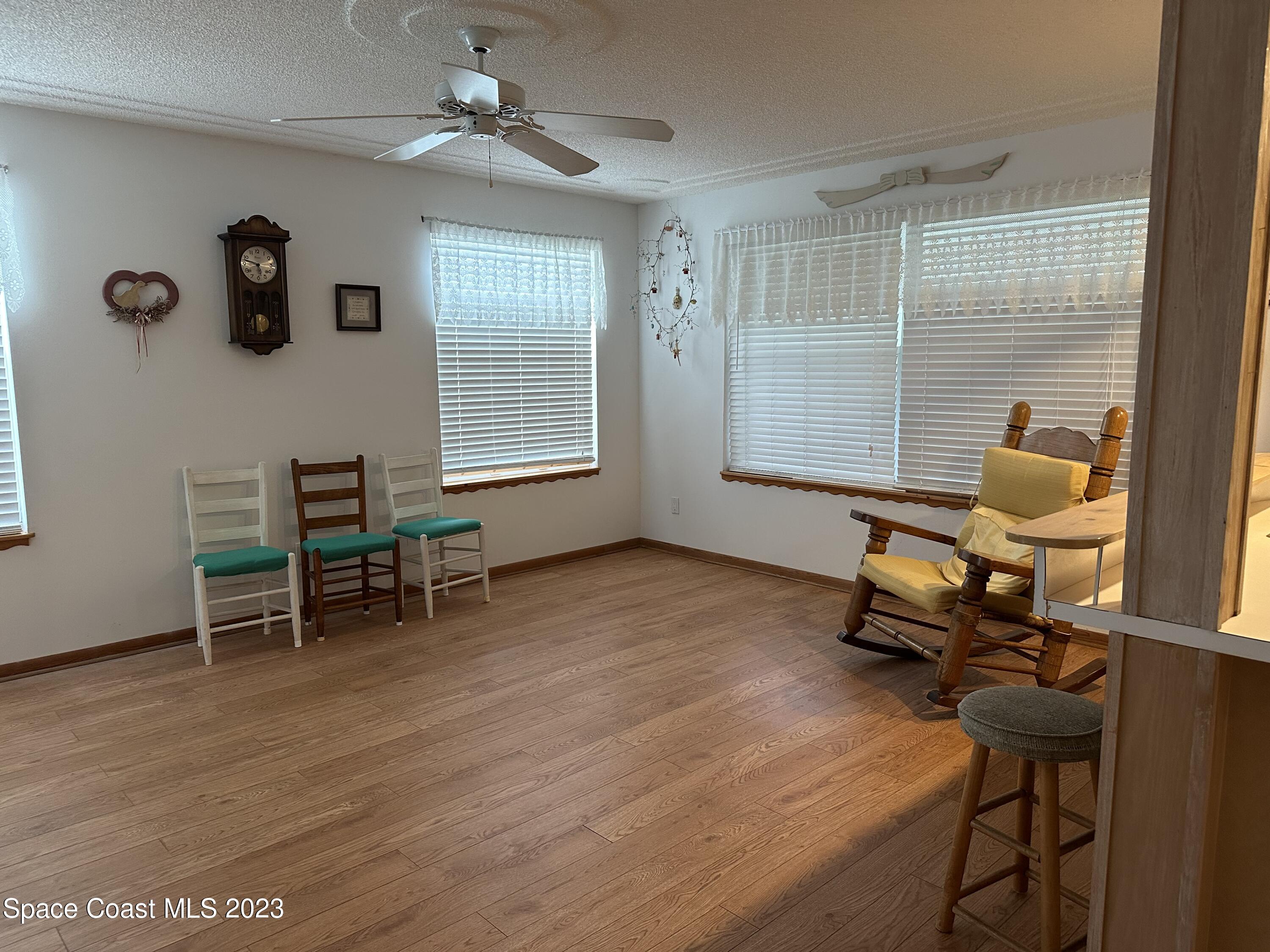 3995 Toby Avenue Malabar, FL 32950 - Photo 15 of 43 a living room with furniture and a window