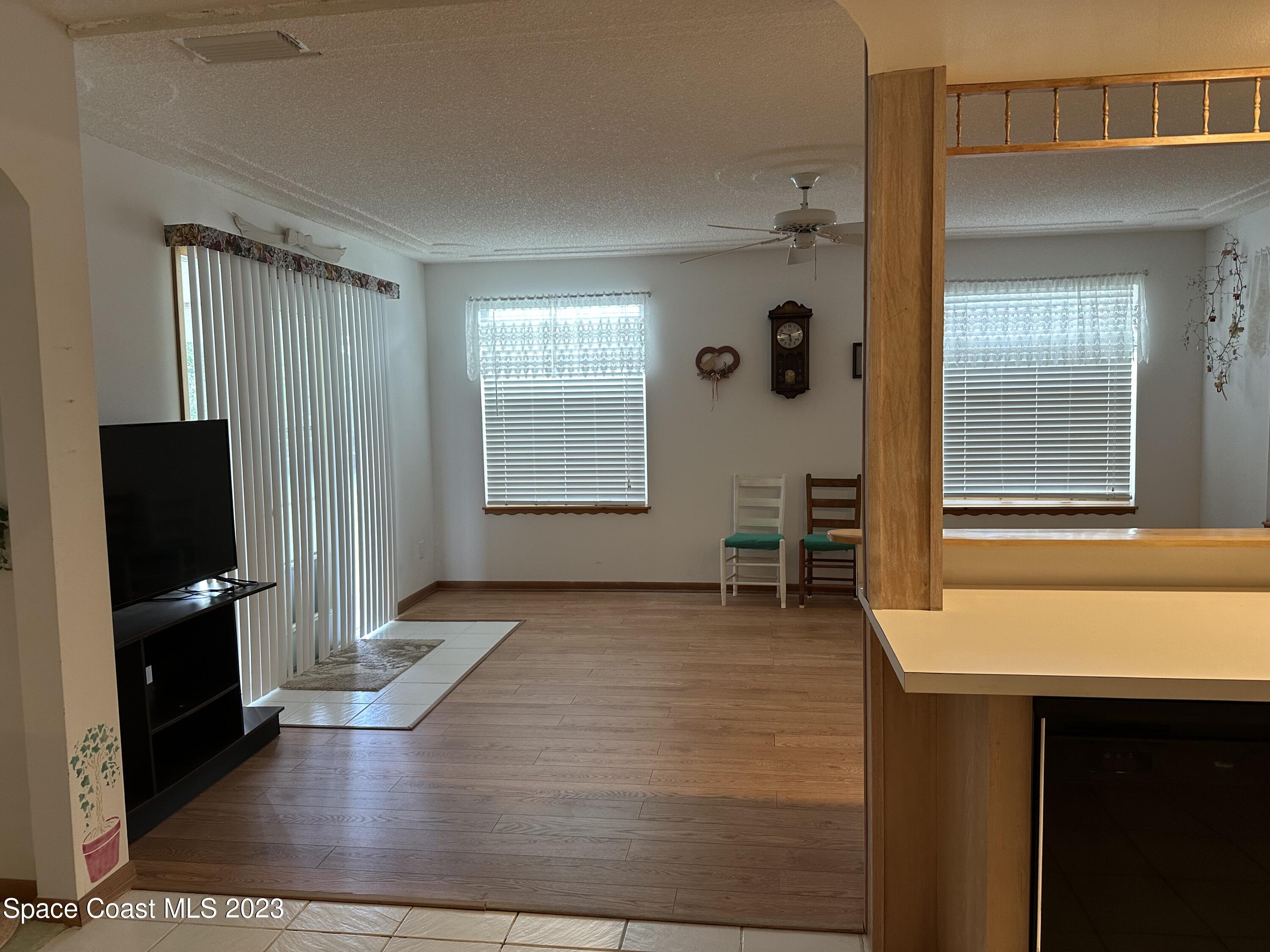 3995 Toby Avenue Malabar, FL 32950 - Photo 16 of 43 a view of livingroom with furniture and windows