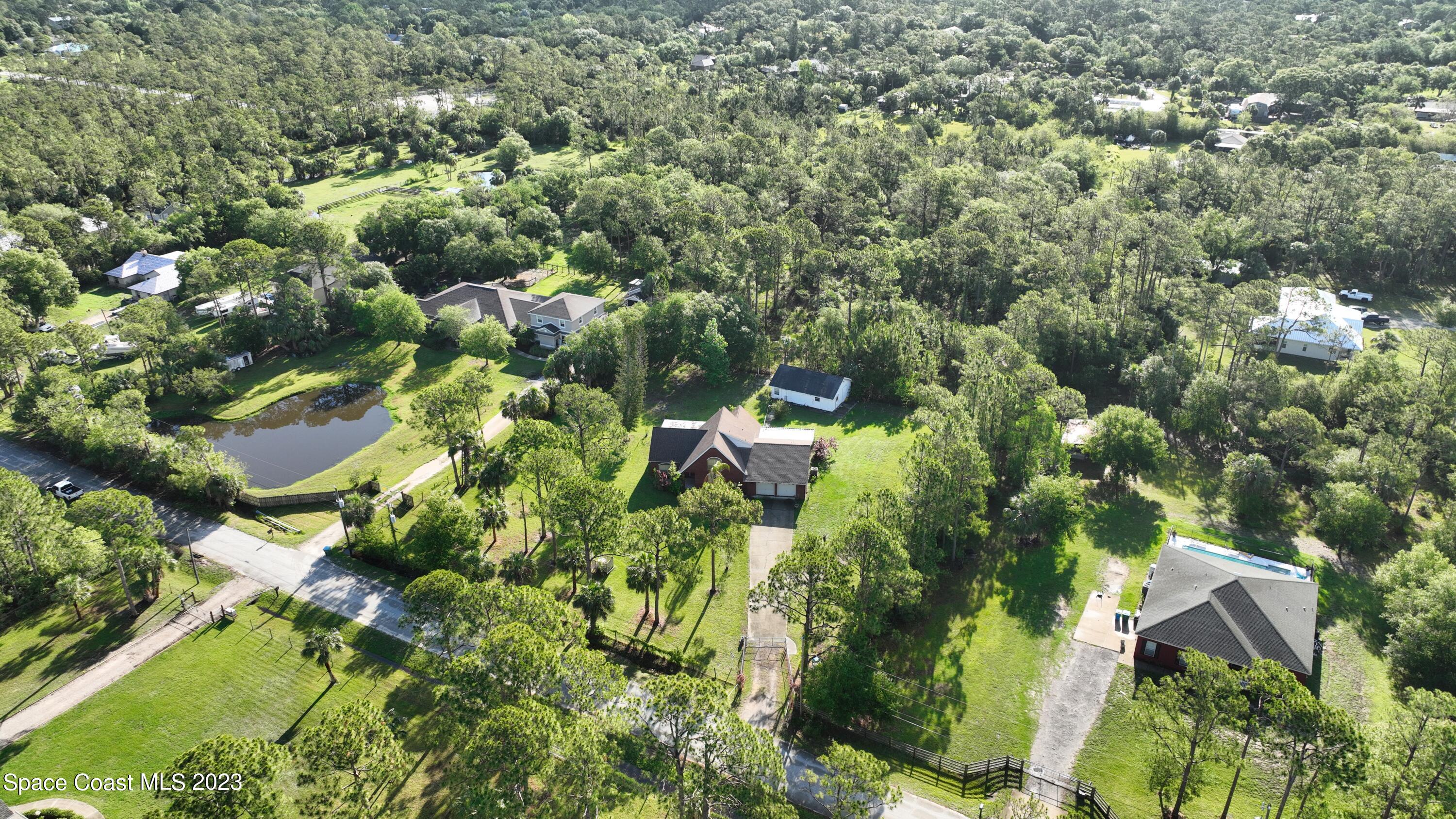 3995 Toby Avenue Malabar, FL 32950 - Photo 2 of 43 a view of a city