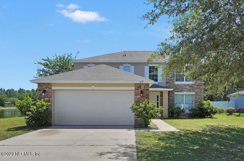 front view of house with a yard