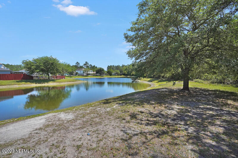 692 Largo Lane Macclenny, FL 32063 - Photo 14 of 41 a view of a lake with houses