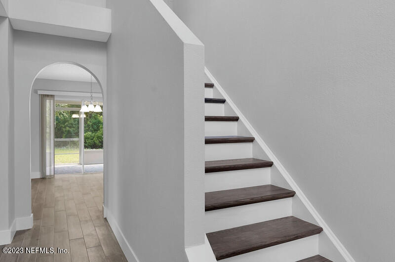 692 Largo Lane Macclenny, FL 32063 - Photo 38 of 41 a view of entryway and hall with wooden floor