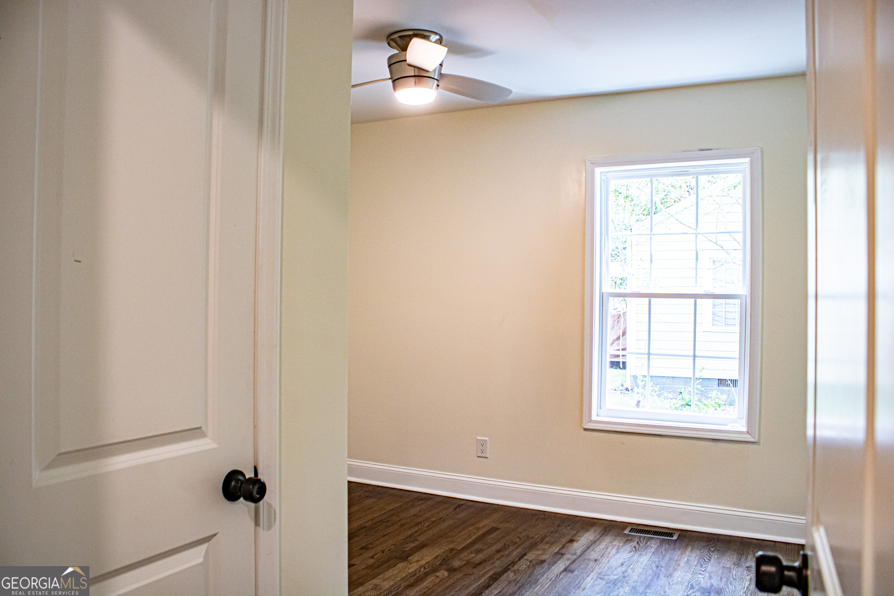 773 Fayetteville Road Southeast Atlanta, GA 30316 - Photo 12 of 17 a view of an empty room with a window