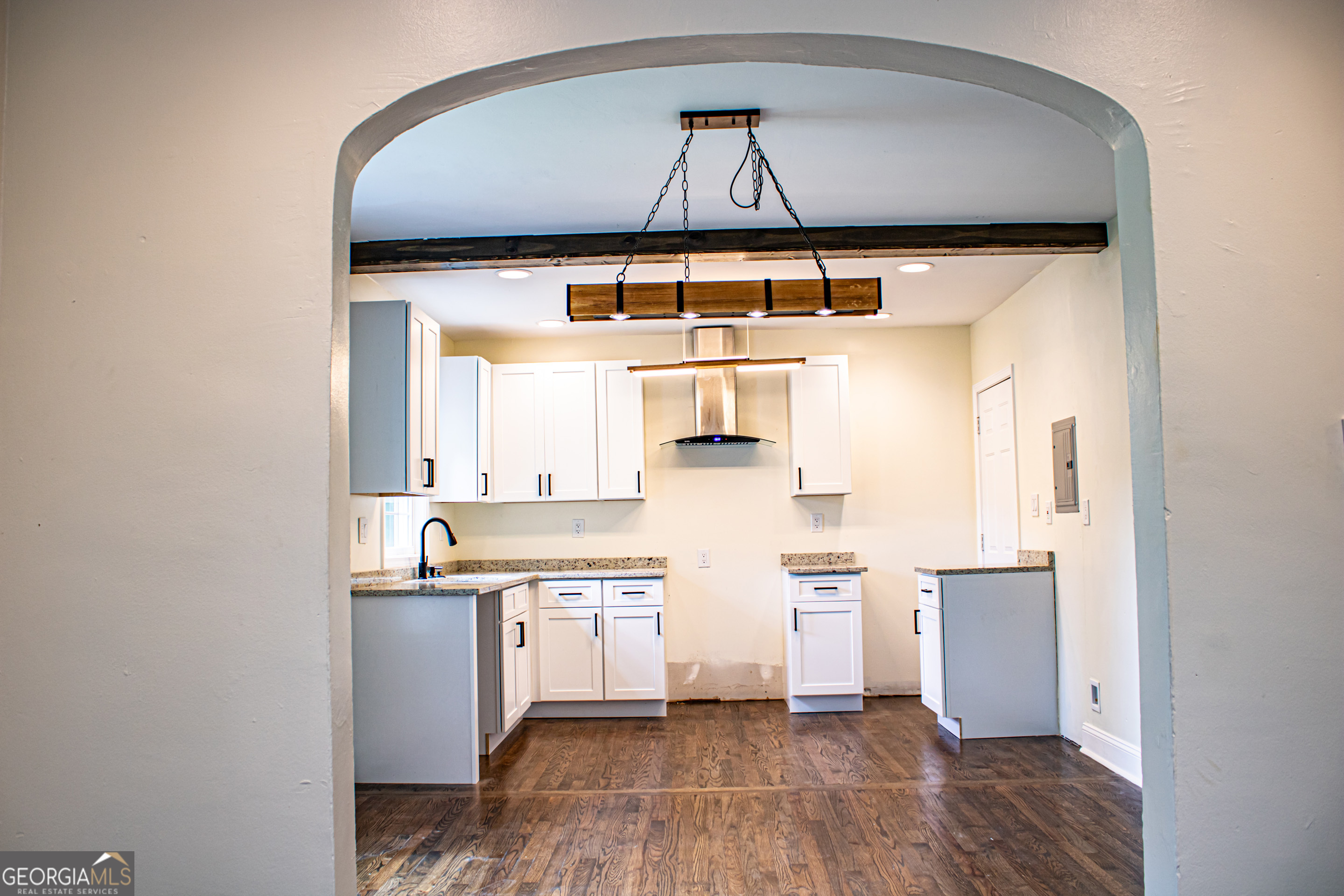773 Fayetteville Road Southeast Atlanta, GA 30316 - Photo 5 of 17 a kitchen with stainless steel appliances a stove a refrigerator and cabinets