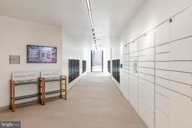 a view of a hallway with workspace