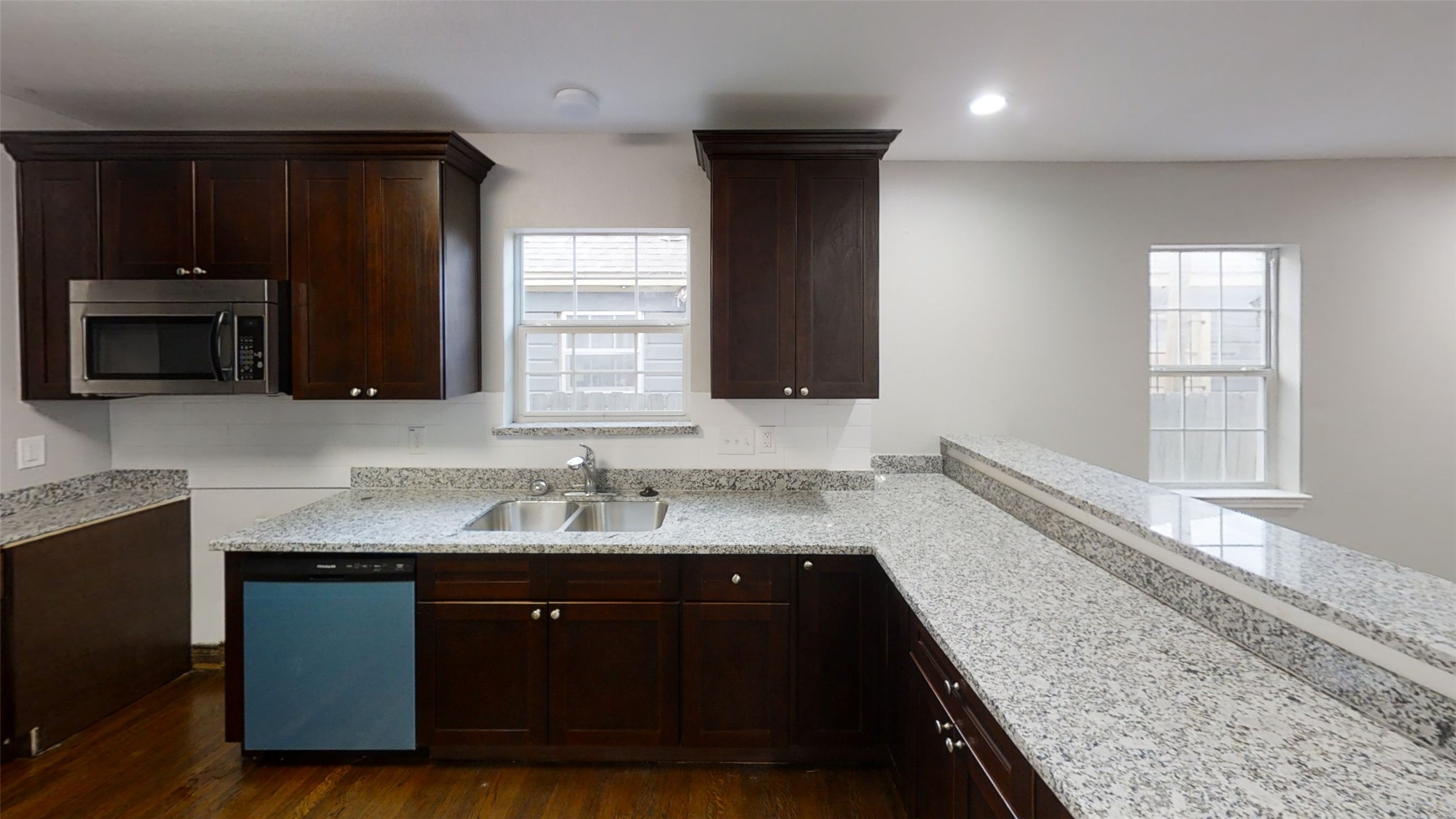 4323 Alice Street Houston, TX 77021 - Photo 2 of 11 a kitchen with a sink and a window
