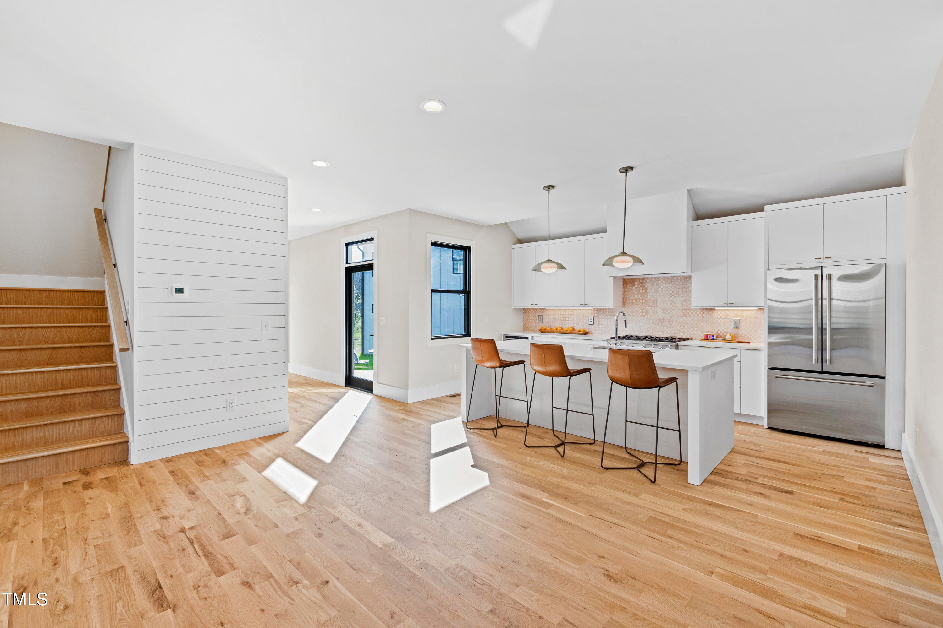 107 Gary Road Carrboro, NC 27510 - Photo 13 of 34 a large kitchen with lots of counter space and furniture