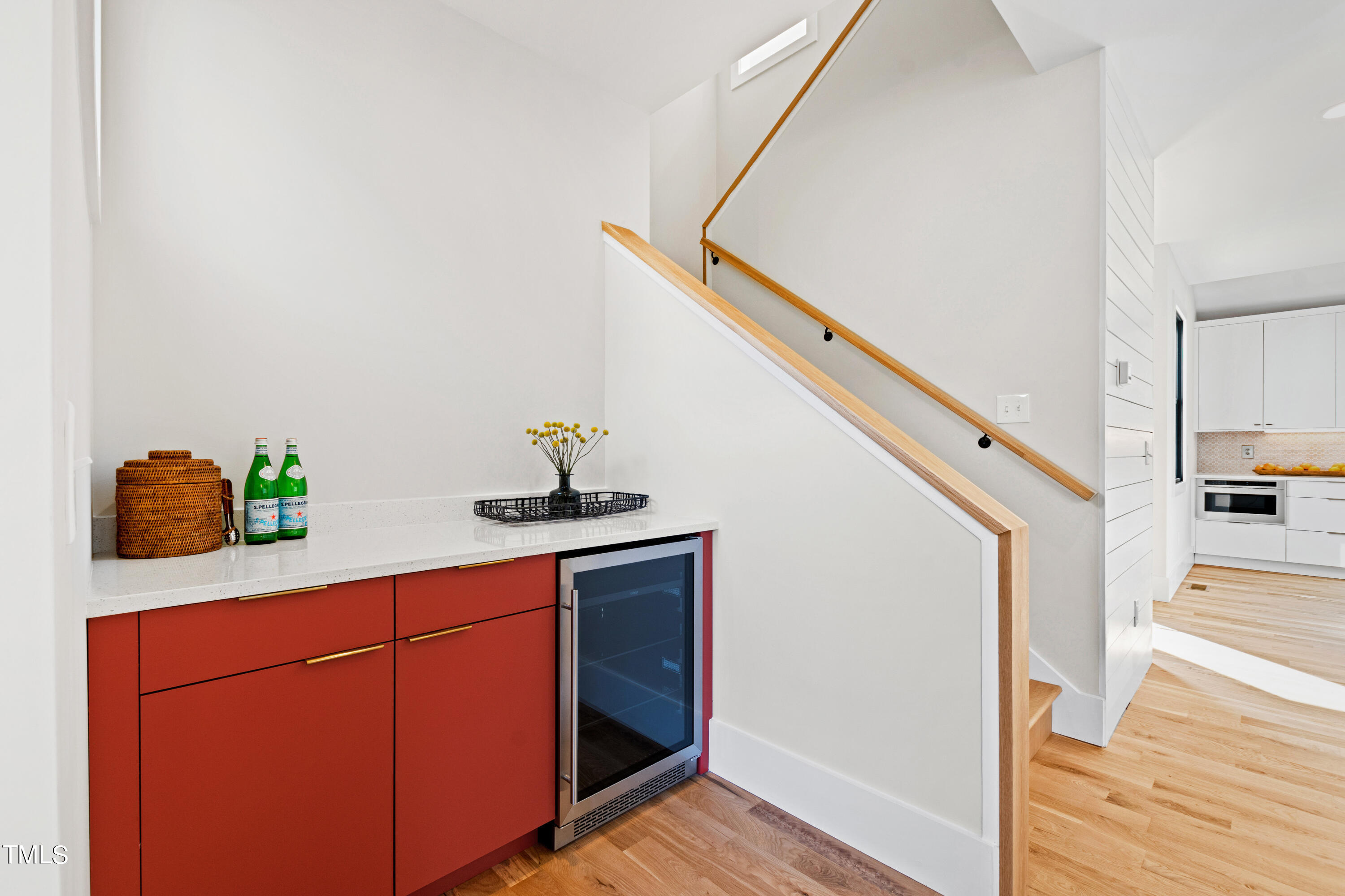 107 Gary Road Carrboro, NC 27510 - Photo 18 of 34 a hallway with painting on the wall and a potted plant