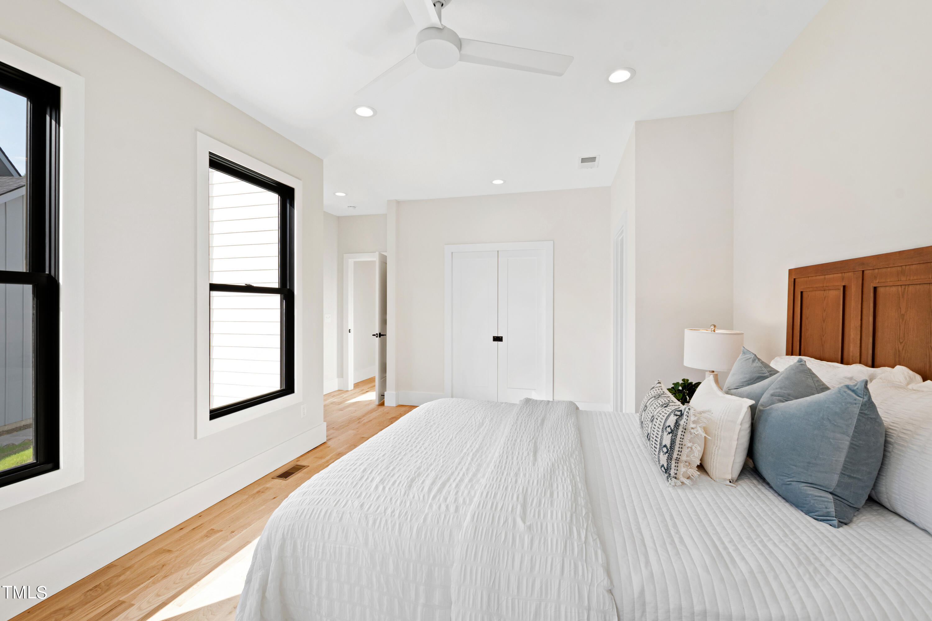 107 Gary Road Carrboro, NC 27510 - Photo 21 of 34 a bedroom with a bed and a window