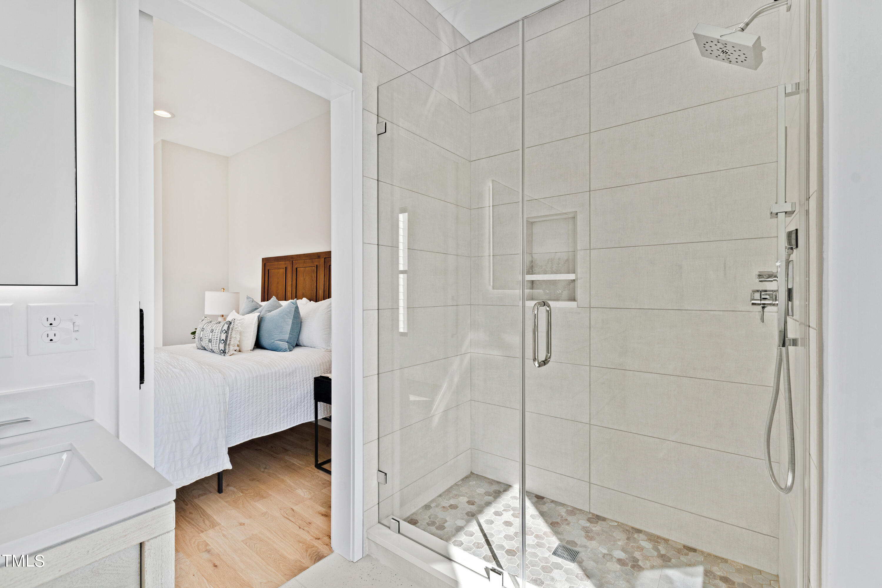 107 Gary Road Carrboro, NC 27510 - Photo 22 of 34 a hall way with a furniture and wooden floor