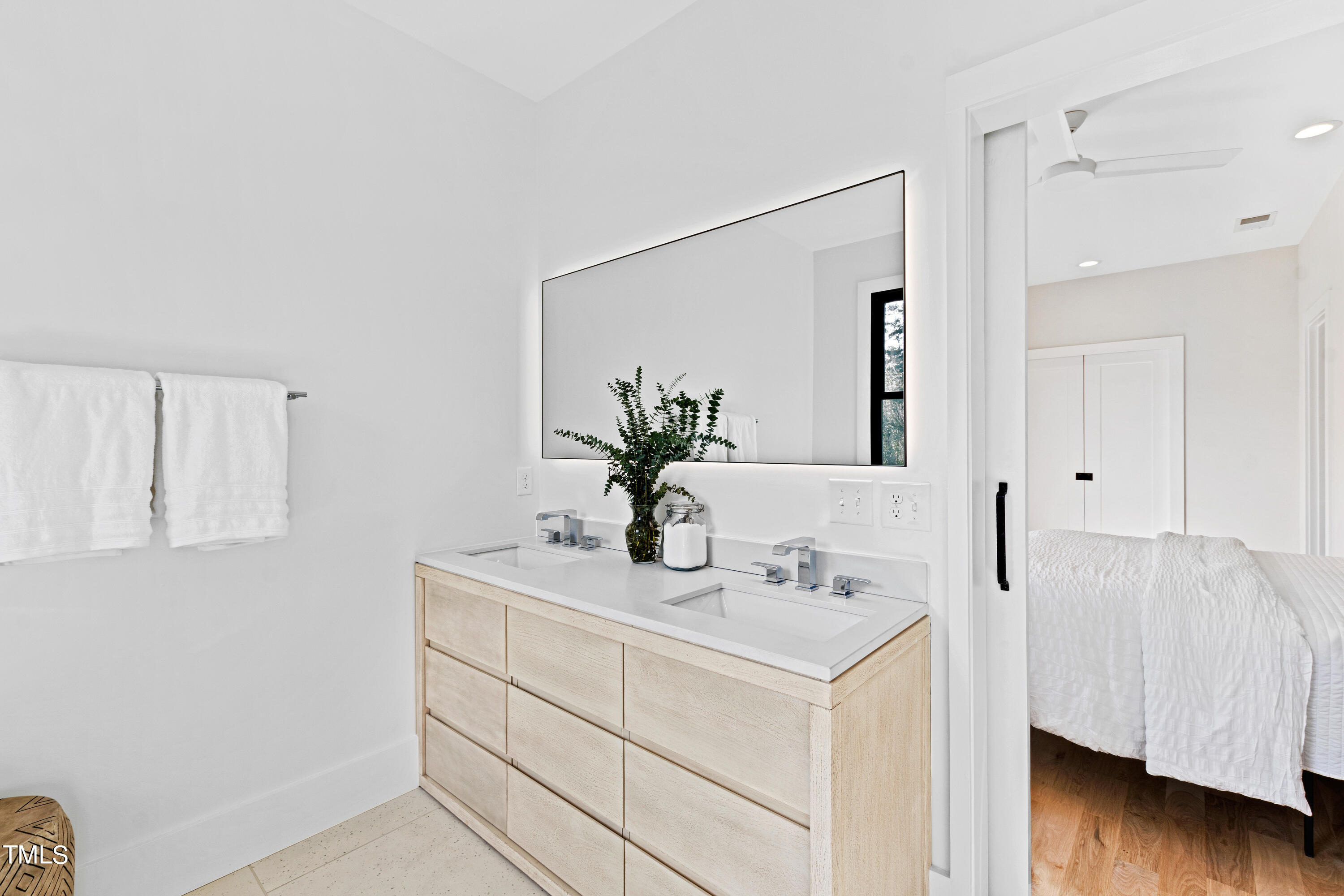 107 Gary Road Carrboro, NC 27510 - Photo 23 of 34 a bathroom with a sink and a mirror