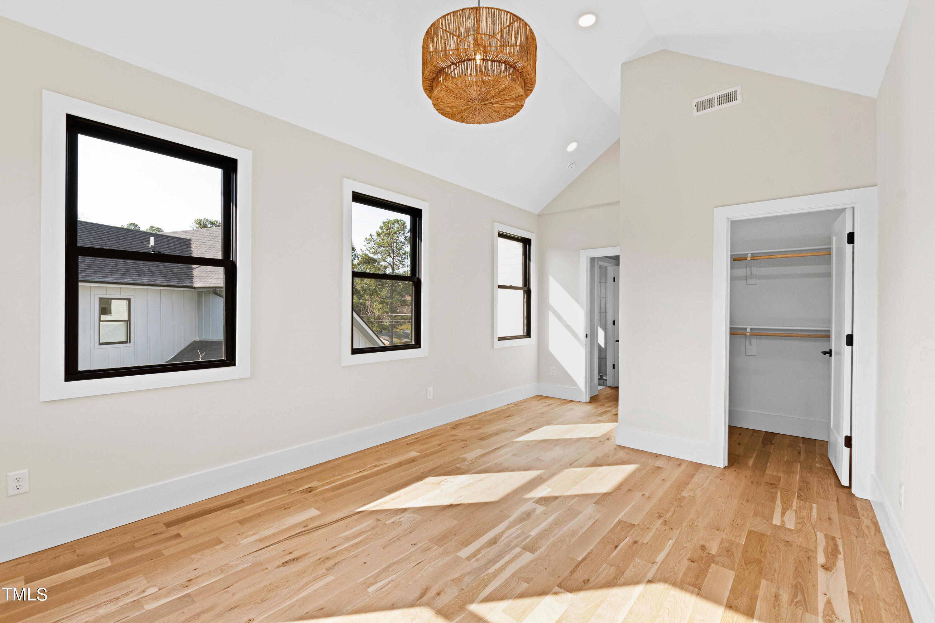 107 Gary Road Carrboro, NC 27510 - Photo 28 of 34 a view of an empty room with wooden floor