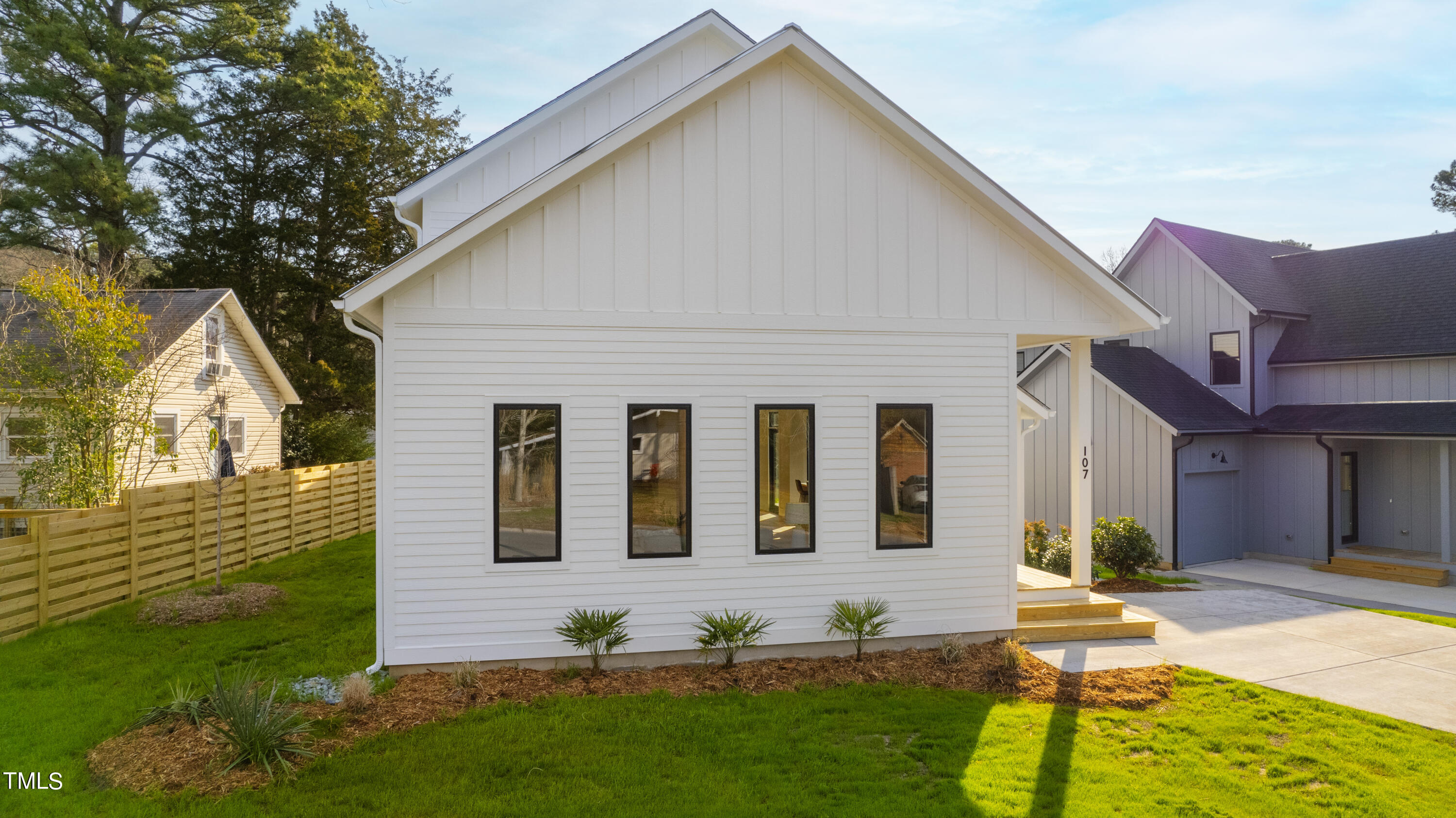 107 Gary Road Carrboro, NC 27510 - Photo 31 of 34 a front view of a house with garden