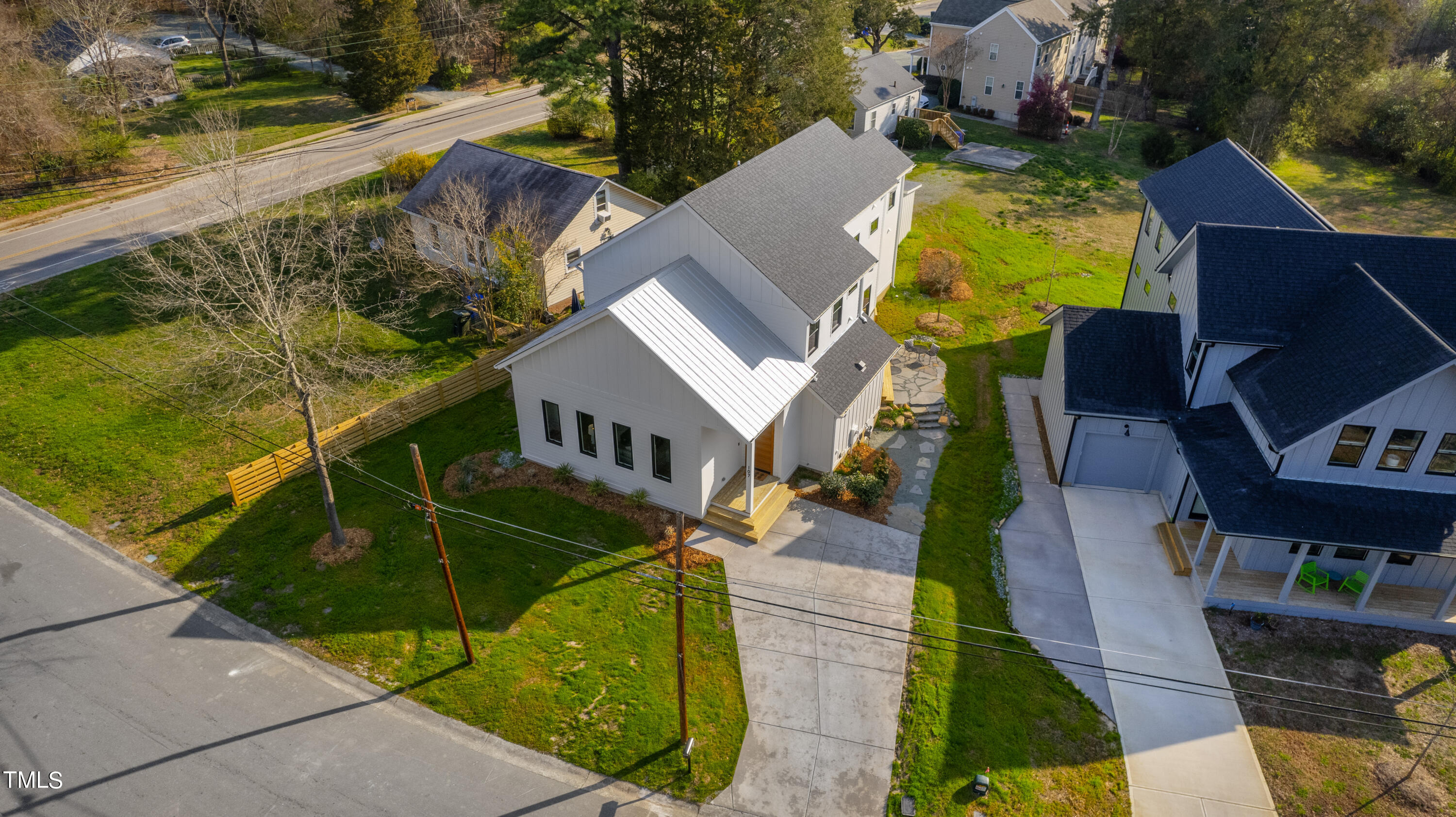 107 Gary Road Carrboro, NC 27510 - Photo 32 of 34 an aerial view of a house with swimming pool and outdoor seating