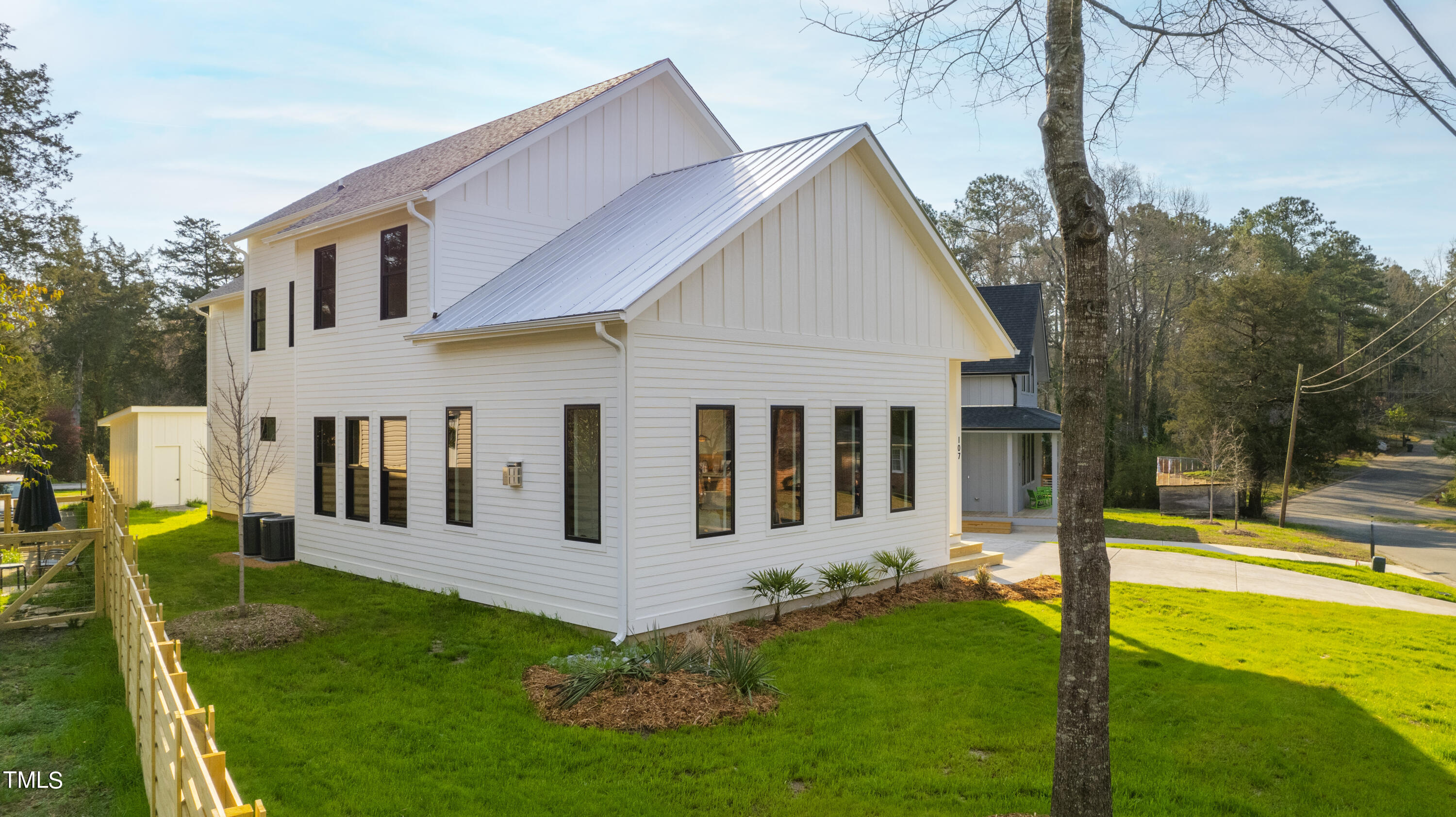 107 Gary Road Carrboro, NC 27510 - Photo 4 of 34 a view of a house with backyard and sitting area