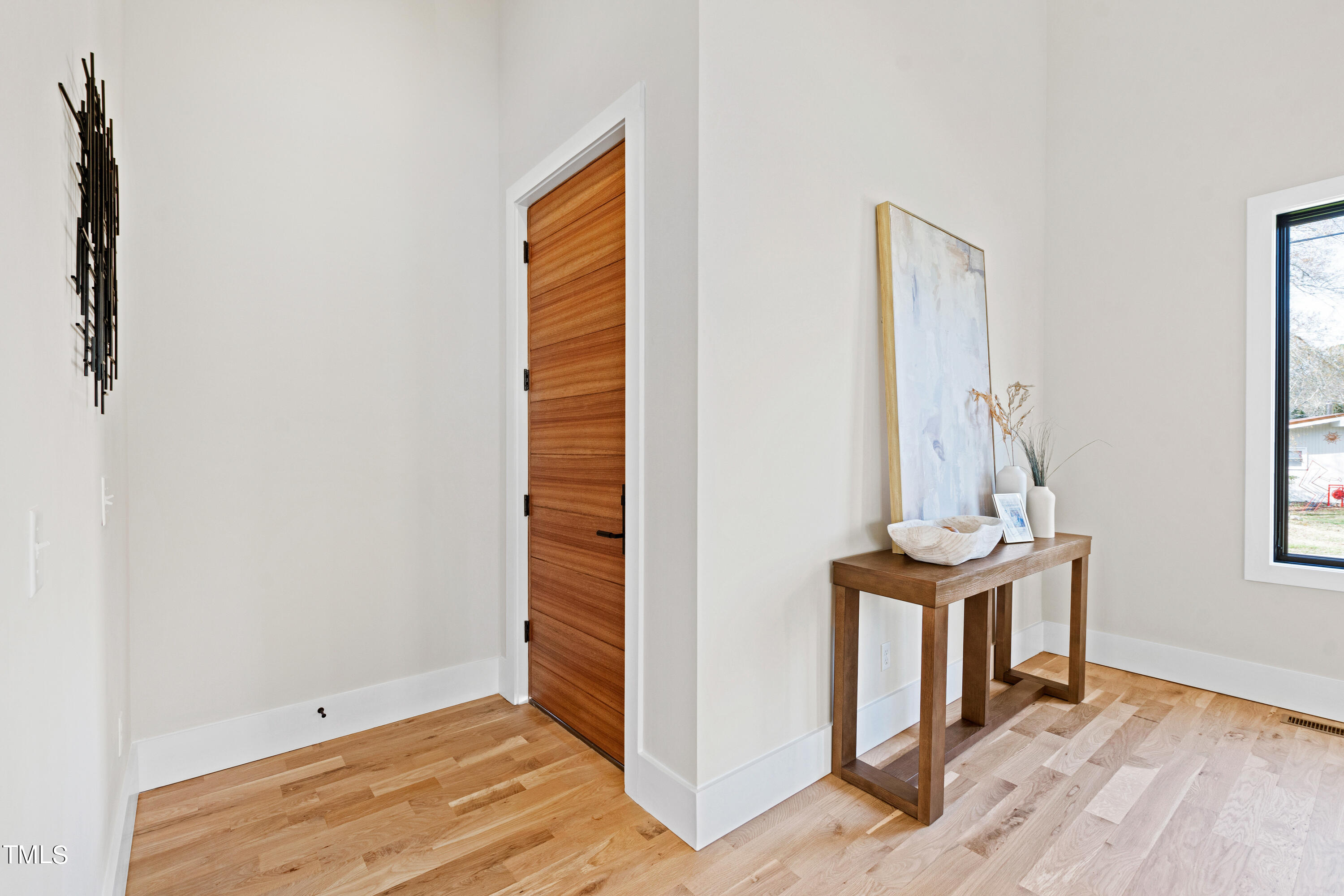 107 Gary Road Carrboro, NC 27510 - Photo 8 of 34 a view of front door with wooden floor
