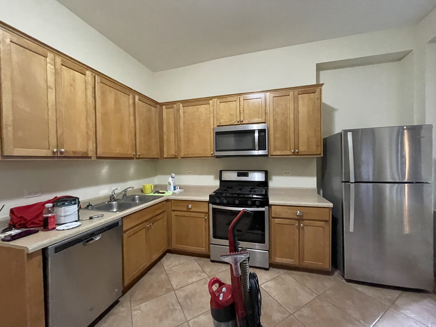 733 North Wells Street, Unit 2 Chicago, IL 60654 - Photo 6 of 12 a kitchen with a sink appliances and cabinets