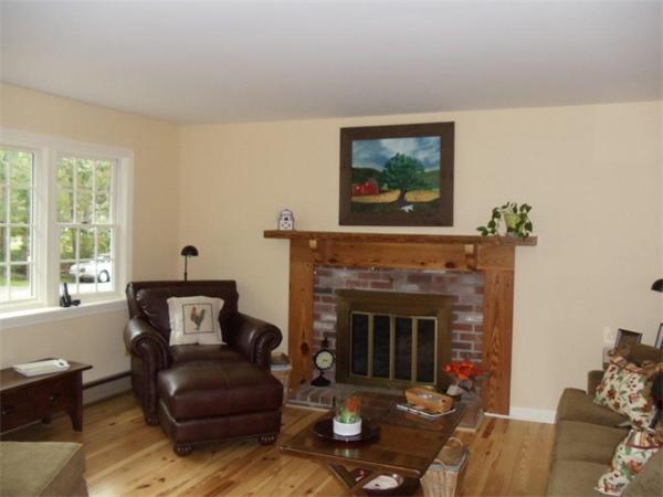 41 Yawl Road Barnstable, MA 02655 - Photo 11 of 25 a living room with furniture and a fireplace