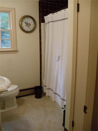 41 Yawl Road Barnstable, MA 02655 - Photo 14 of 25 a bathroom with a toilet and a shower