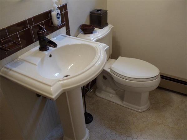 41 Yawl Road Barnstable, MA 02655 - Photo 15 of 25 a bathroom with a toilet sink and mirror