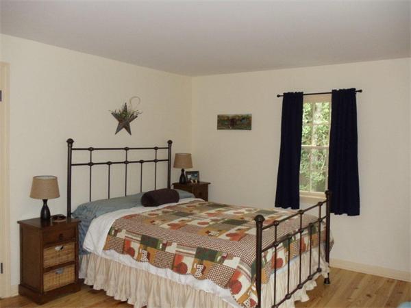 41 Yawl Road Barnstable, MA 02655 - Photo 16 of 25 a bedroom with a bed and a window