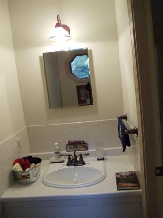 41 Yawl Road Barnstable, MA 02655 - Photo 17 of 25 a bathroom with a sink and a mirror