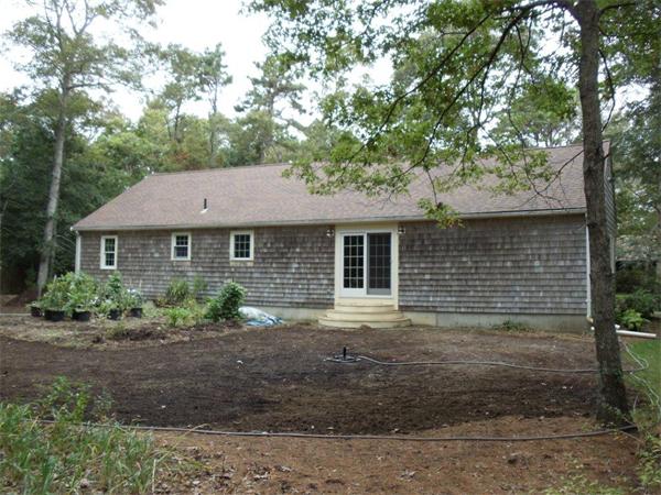 41 Yawl Road Barnstable, MA 02655 - Photo 22 of 25 front view of a house with a yard