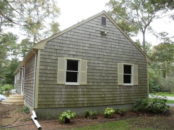 41 Yawl Road Barnstable, MA 02655 - Photo 23 of 25 a front view of a house with garden