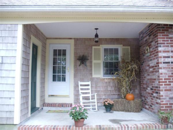 41 Yawl Road Barnstable, MA 02655 - Photo 5 of 25 a view of a house with a potted plant and a window