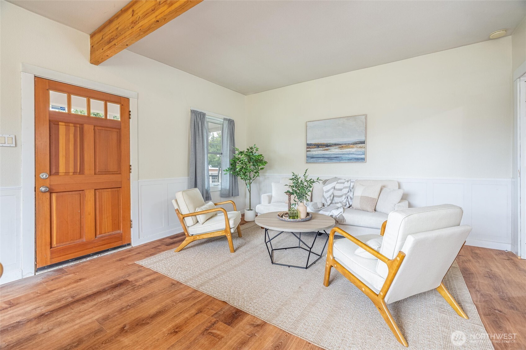 812 Sumas Avenue Sumas, WA 98295 - Photo 8 of 24 a living room with furniture a wooden floor and next to a window