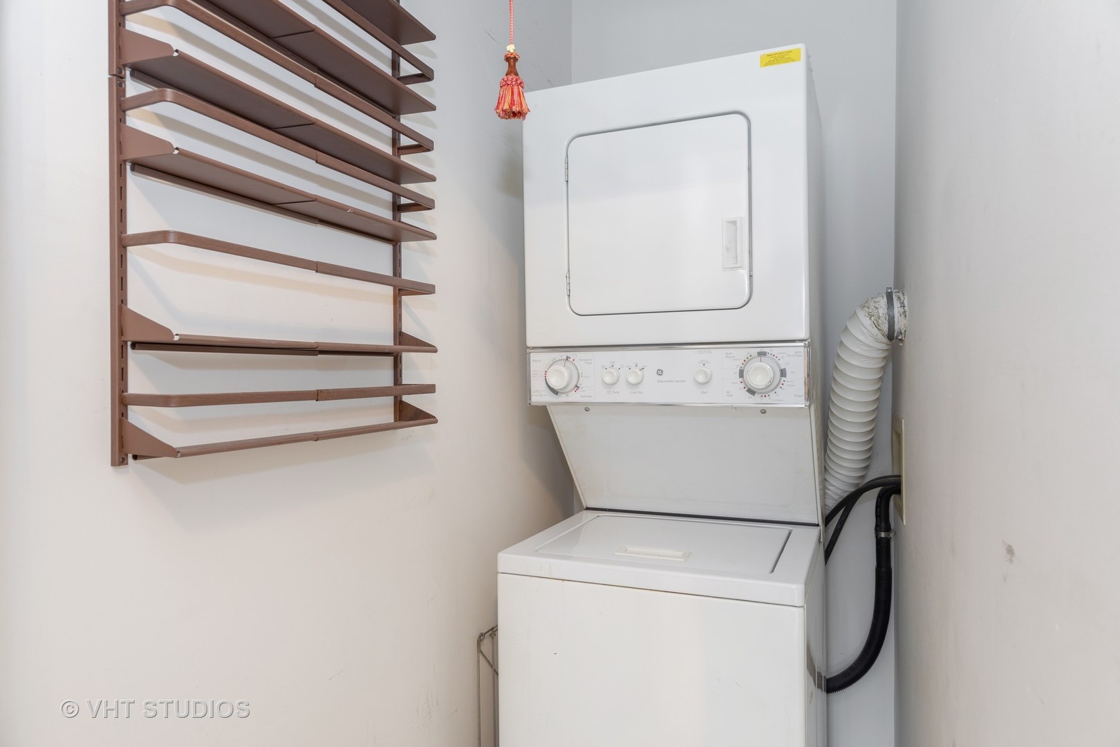 3275 Kirchoff Road, Unit 231 Rolling Meadows, IL 60008 - Photo 11 of 12 a utility room with dryer and washer