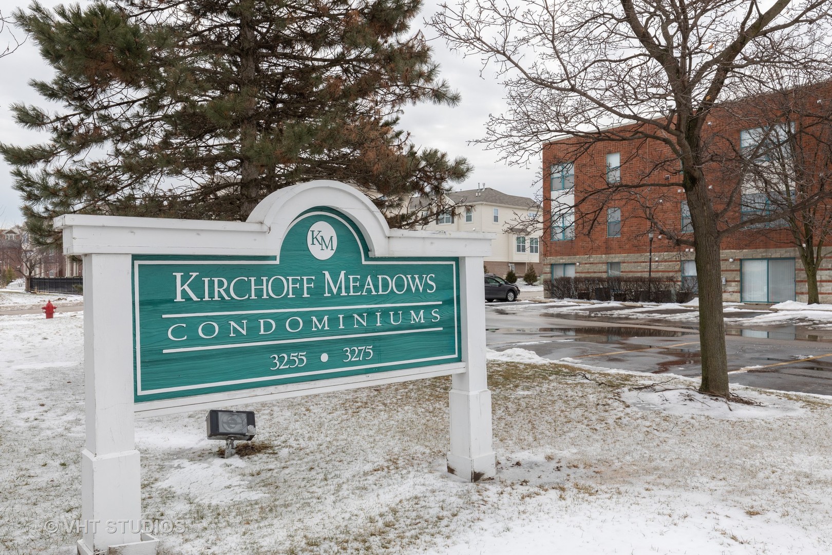 3275 Kirchoff Road, Unit 231 Rolling Meadows, IL 60008 - Photo 12 of 12 a sign on the side of a road