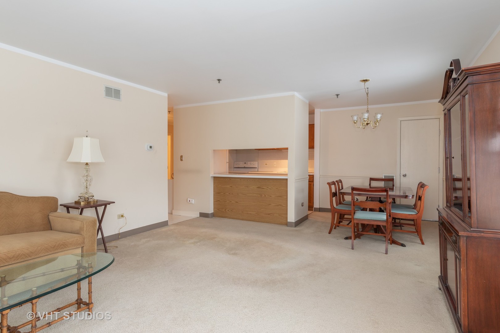 3275 Kirchoff Road, Unit 231 Rolling Meadows, IL 60008 - Photo 4 of 12 a living room with furniture