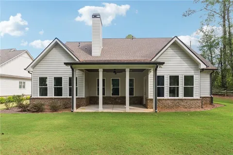 front view of a house with a yard