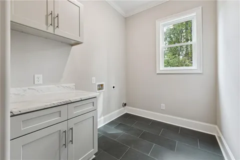 a room with cabinets and window