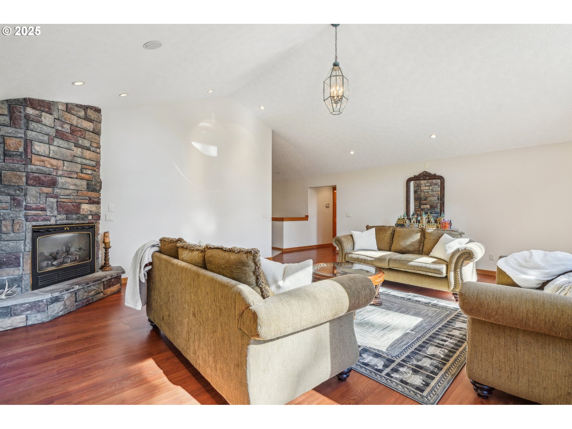 232 Upper Lakeview Rd Road White Salmon, WA 98672 - Photo 17 of 46 a living room with furniture and a fireplace