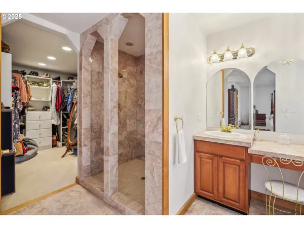 a bathroom with a double vanity sink and a mirror