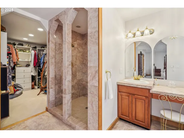a bathroom with a double vanity sink and a mirror