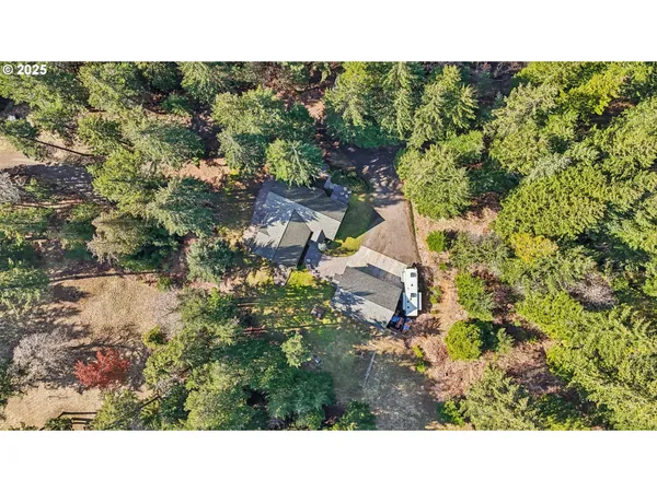 a black and white photo of a house