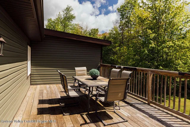 a view of a chairs on the roof deck