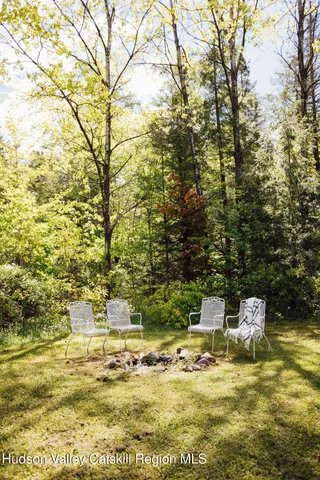 a view of a swimming pool with an ocean view