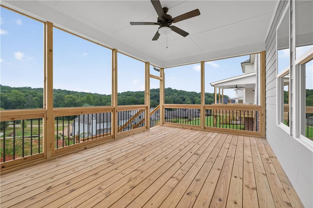 3787 Cheyenne Lane Jefferson, GA 30549 - Photo 28 of 82 a view of a balcony with wooden floor