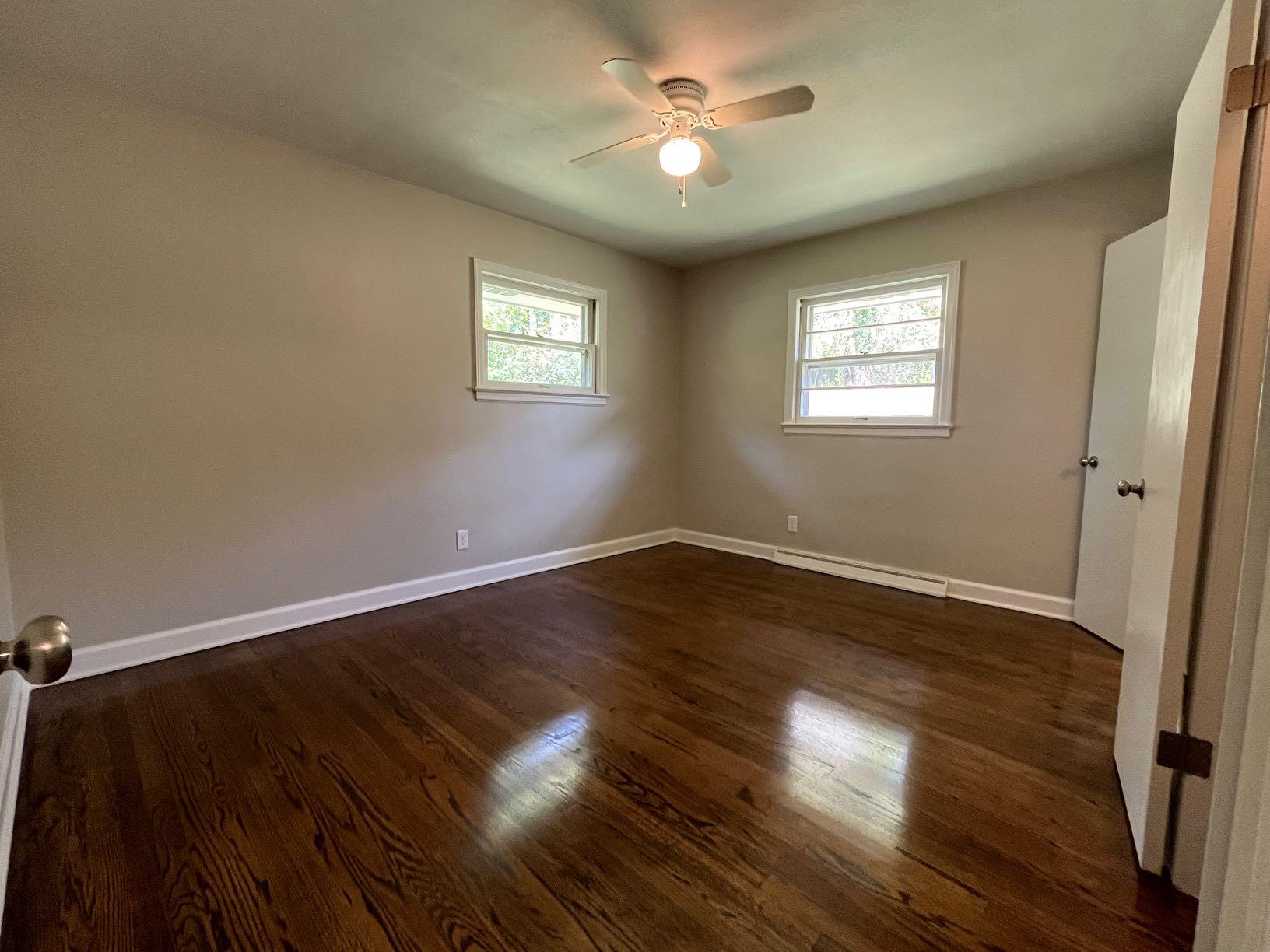 2548 Beverly Boulevard Southwest Roanoke, VA 24015 - Photo 13 of 17 a view of empty room with wooden floor and fan