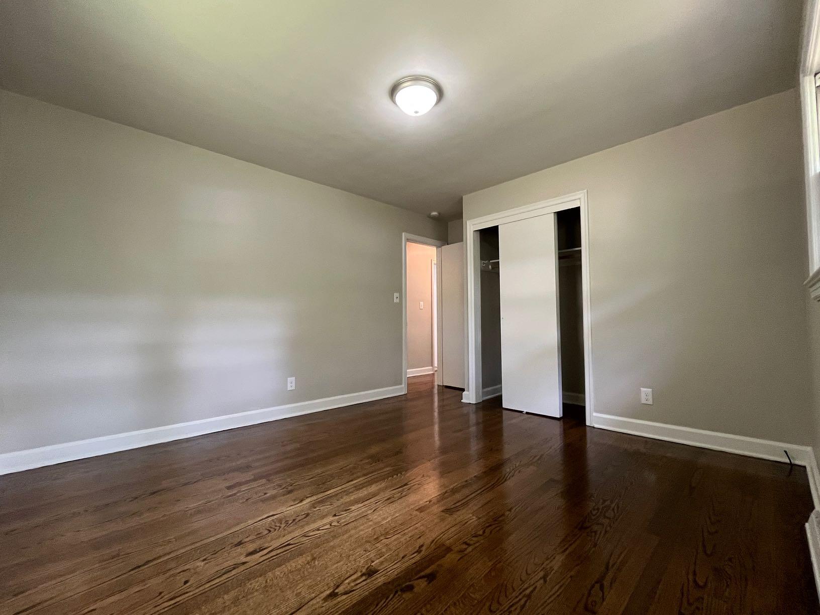 2548 Beverly Boulevard Southwest Roanoke, VA 24015 - Photo 15 of 17 a view of an empty room with wooden floor