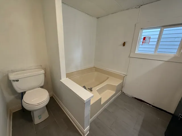 a bathroom with a sink and a toilet