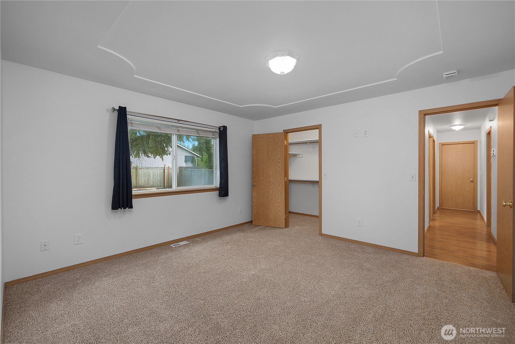 7606 187th Avenue Southwest Rochester, WA 98579 - Photo 15 of 28 an empty room with windows and closet