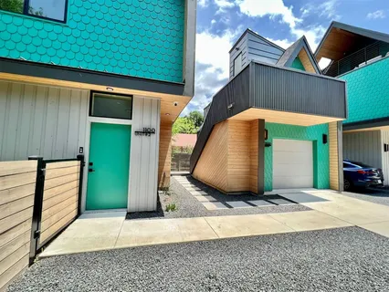a view of a back yard of the house