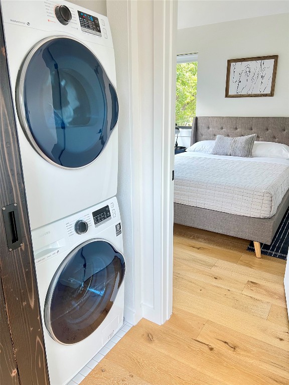 1100 Brass Street, Unit 2 Austin, TX 78702 - Photo 11 of 27 a bedroom with a washer and dryer