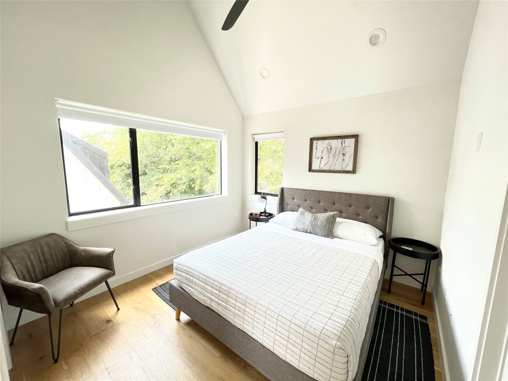 1100 Brass Street, Unit 2 Austin, TX 78702 - Photo 16 of 27 a bedroom with a bed and a window