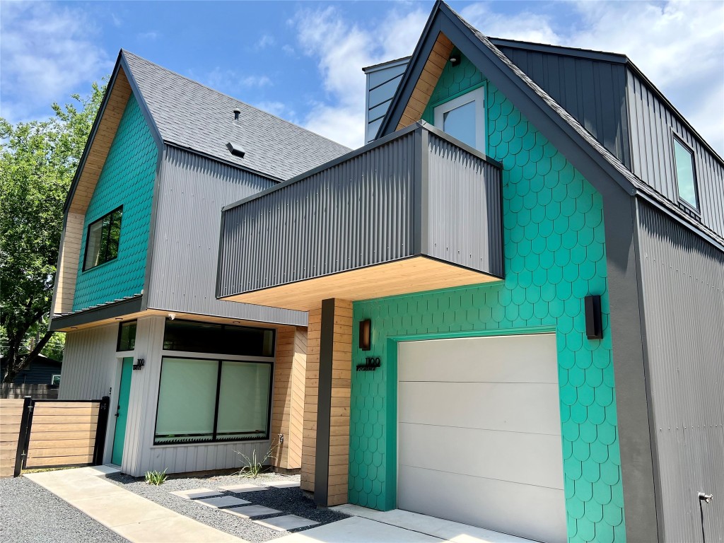1100 Brass Street, Unit 2 Austin, TX 78702 - Photo 27 of 27 a view of a house with a yard and wooden fence